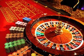 Sesi permainan Blueprint Gaming menunjukkan gulungan, tombol putar, dan riwayat pembayaran